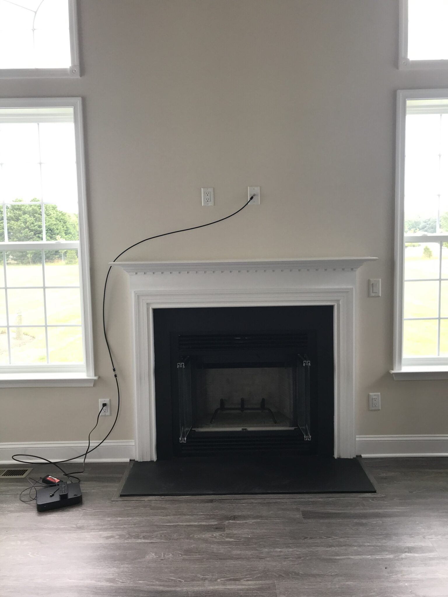 How to Safely Mount a TV Above the Fireplace (With examples)