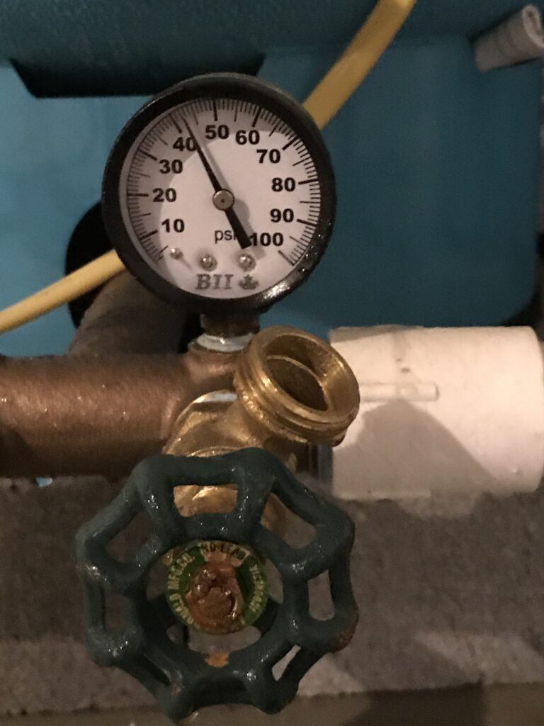 How to Fix Low Water Pressure When You Have a Well System - well pump pressure gauge