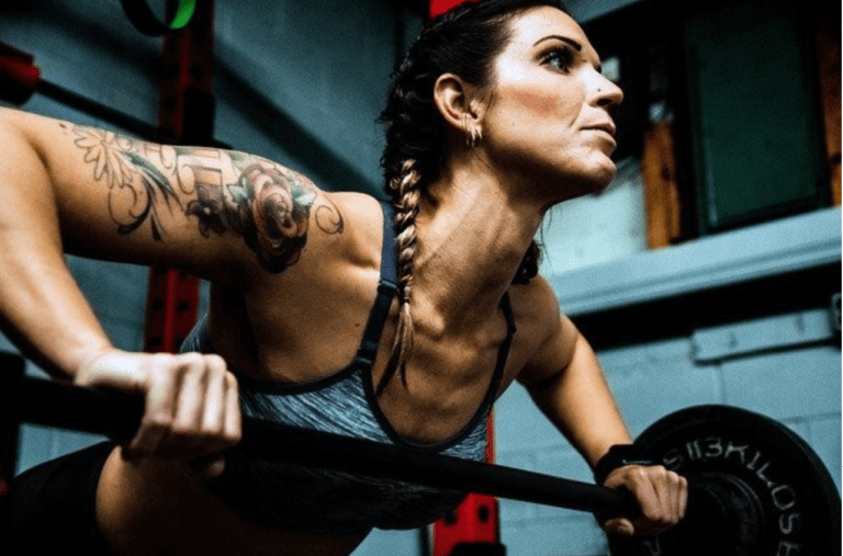 Is It Better to Invest in Home Gym Equipment or Join a Gym? - Woman exercising