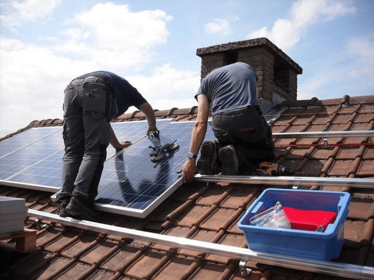 Advantages and Disadvantages of Solar Energy for Your Home - Installing Solar Panels on a Roof