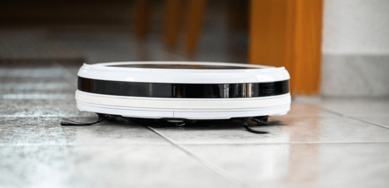 Do Robot Vacuum Cleaners Really Work? - Robot vacuum cleaner cleaning the floor