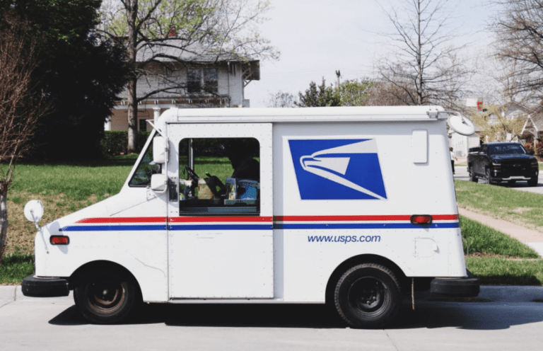 How Do I Find Out What Time My Mail Comes? - USPS Mail Carrier Van