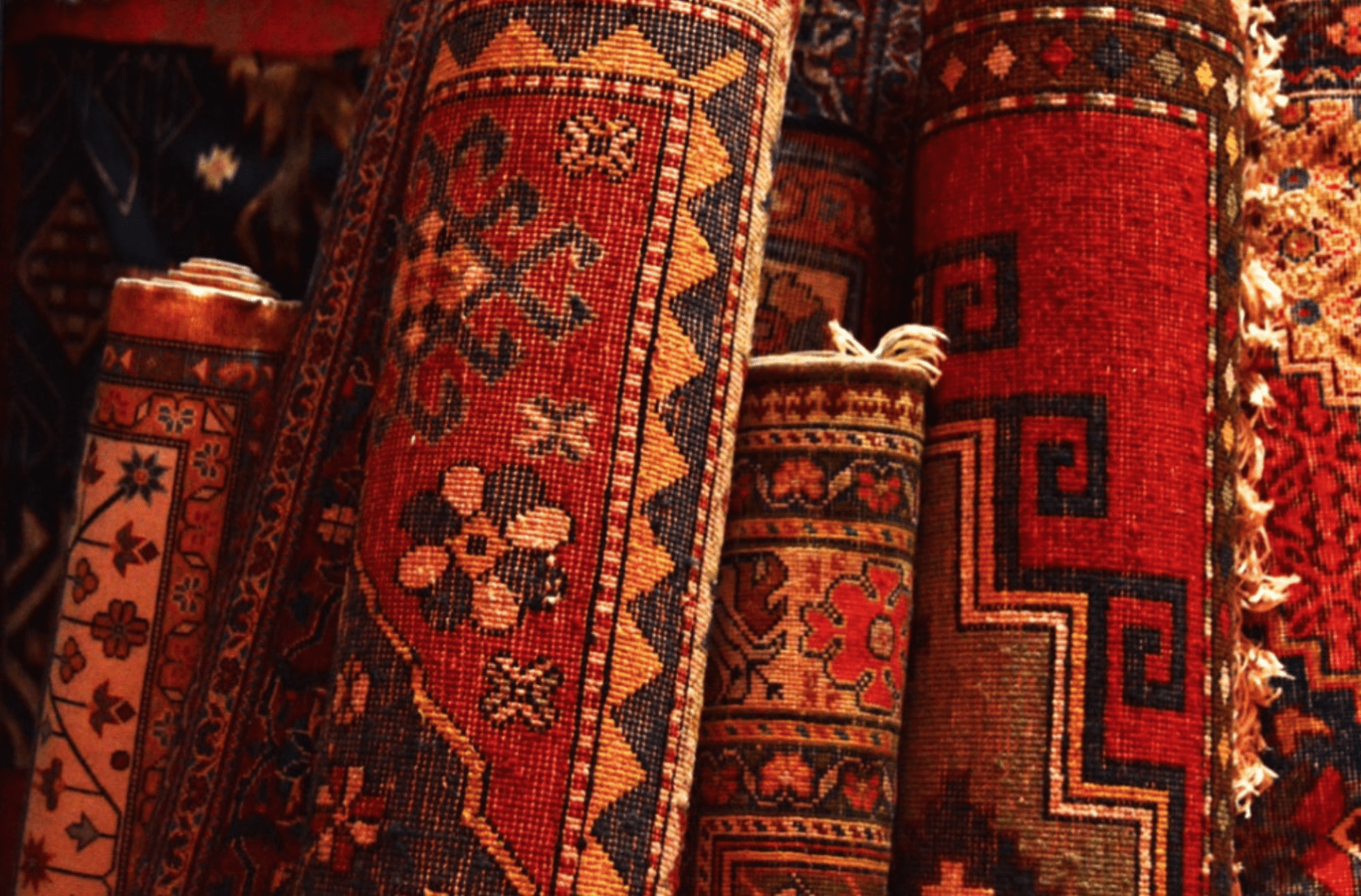 Is it Okay to Put an Area Rug Over Carpet? (More to Consider Than Looks)