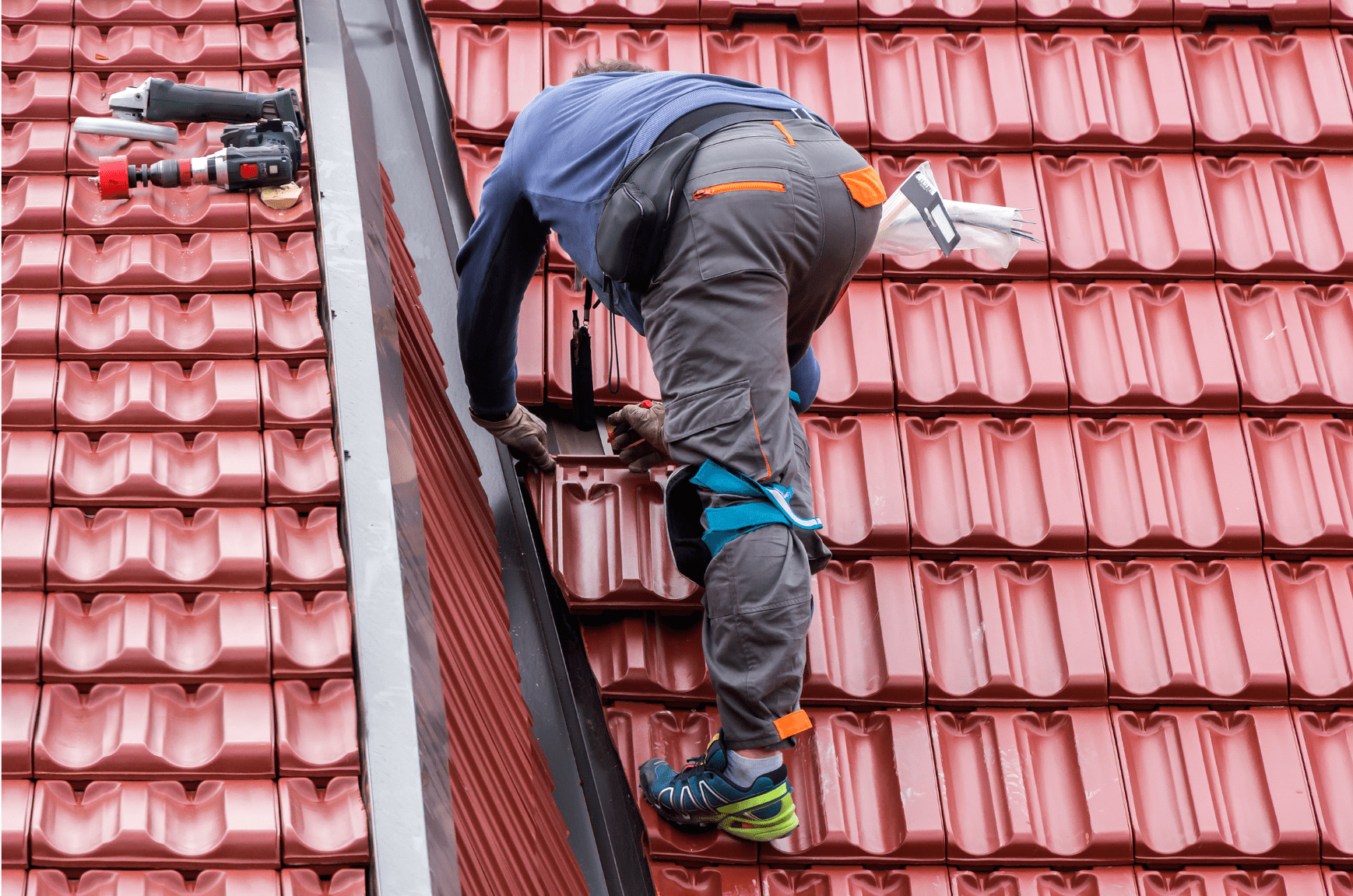 Plumber fixing roof vent